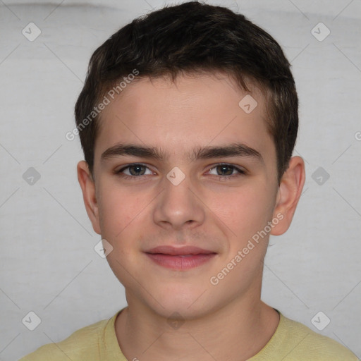 Joyful white child male with short  brown hair and brown eyes