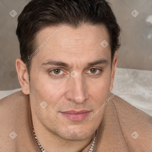 Joyful white adult male with short  brown hair and brown eyes