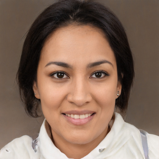 Joyful white young-adult female with medium  brown hair and brown eyes