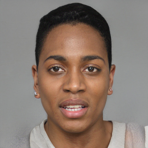 Joyful black young-adult female with short  black hair and brown eyes