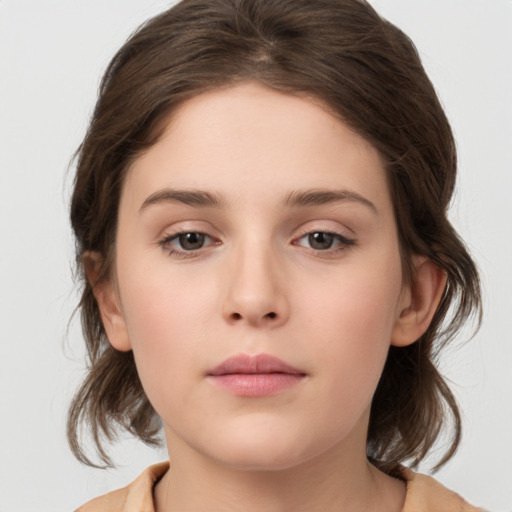 Neutral white young-adult female with medium  brown hair and brown eyes