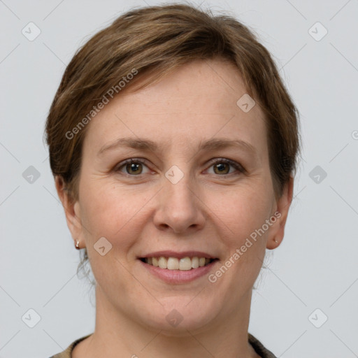 Joyful white young-adult female with short  brown hair and grey eyes