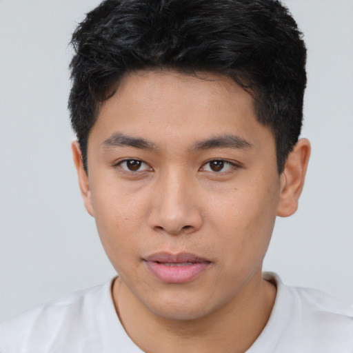 Neutral asian young-adult male with short  brown hair and brown eyes