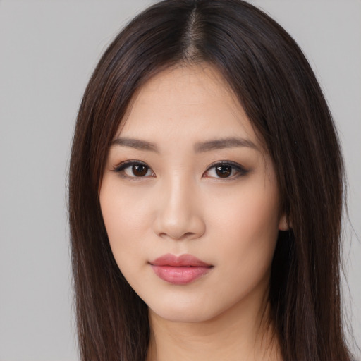 Neutral asian young-adult female with long  brown hair and brown eyes