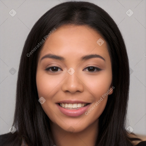 Joyful latino young-adult female with long  brown hair and brown eyes