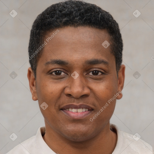 Joyful latino young-adult male with short  brown hair and brown eyes