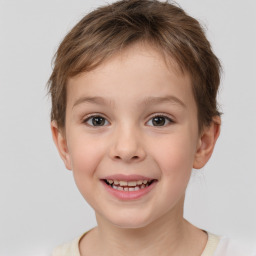 Joyful white child female with short  brown hair and brown eyes