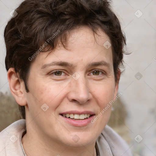 Joyful white adult male with short  brown hair and grey eyes