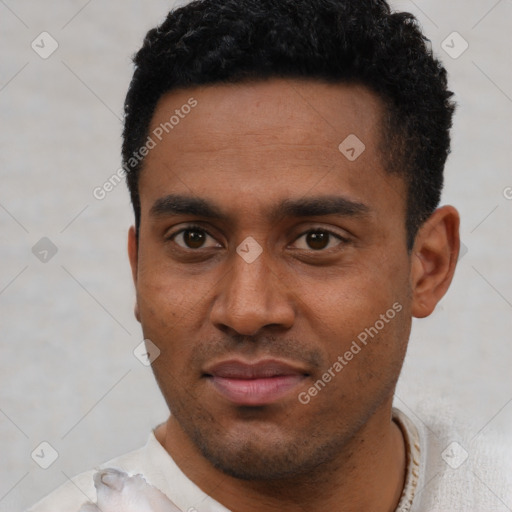 Neutral latino young-adult male with short  black hair and brown eyes