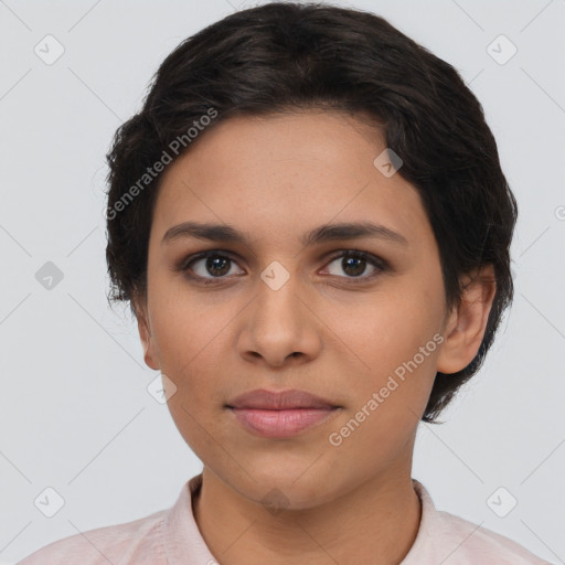 Joyful latino young-adult female with short  brown hair and brown eyes