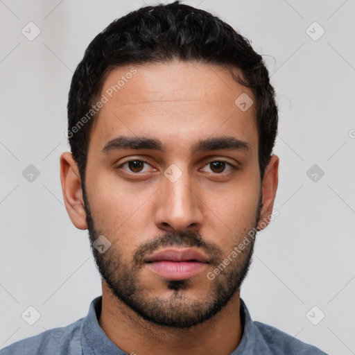 Neutral white young-adult male with short  black hair and brown eyes