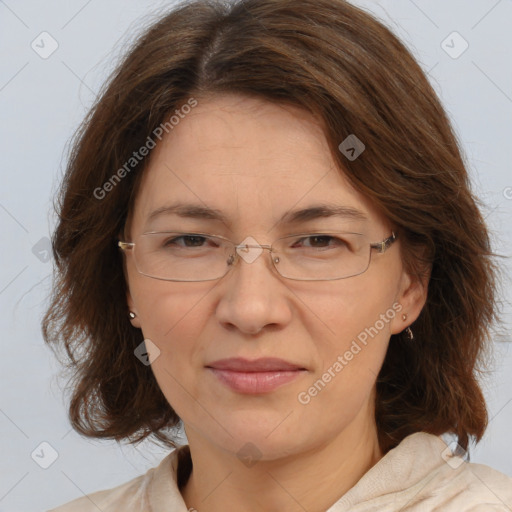 Joyful white adult female with medium  brown hair and brown eyes