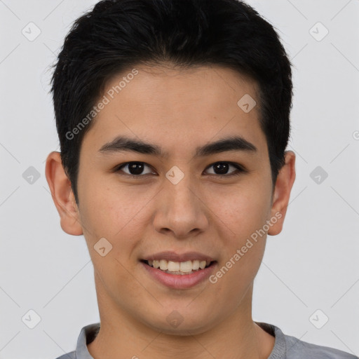 Joyful asian young-adult male with short  brown hair and brown eyes