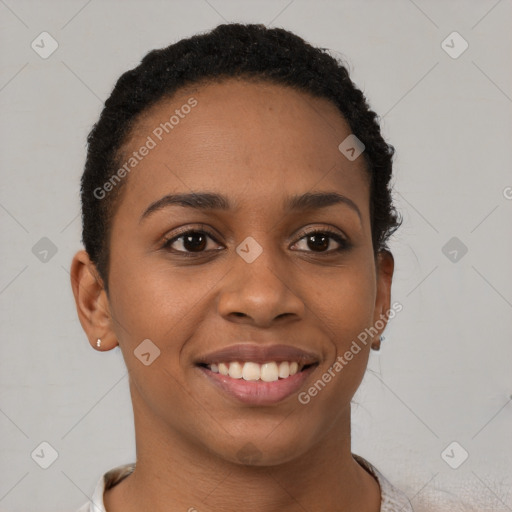 Joyful black young-adult female with short  brown hair and brown eyes