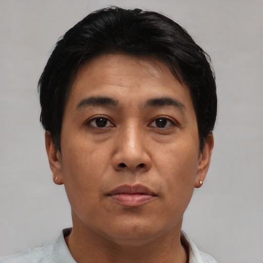 Neutral asian young-adult male with short  brown hair and brown eyes