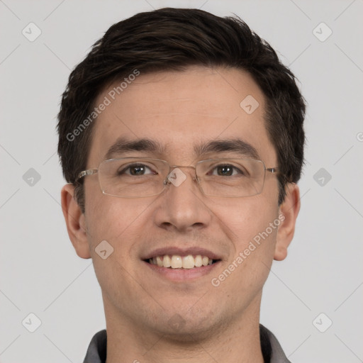 Joyful white young-adult male with short  black hair and brown eyes