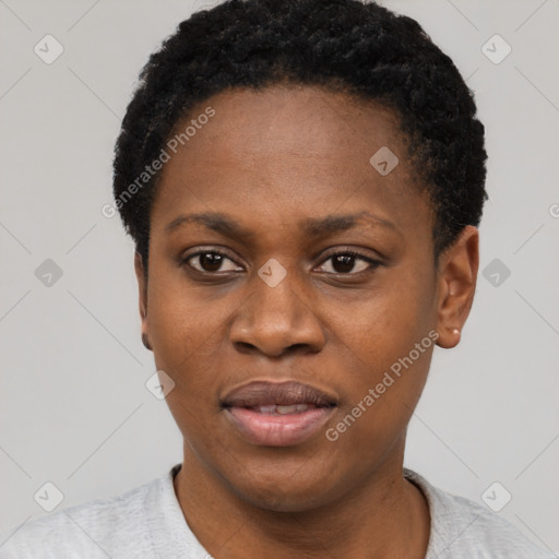 Joyful black young-adult female with short  black hair and brown eyes