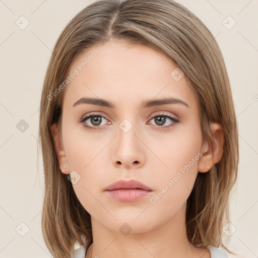 Neutral white young-adult female with long  brown hair and brown eyes