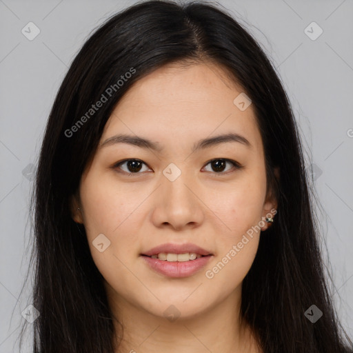 Joyful asian young-adult female with long  brown hair and brown eyes