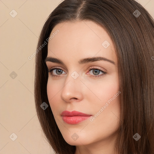 Neutral white young-adult female with long  brown hair and brown eyes