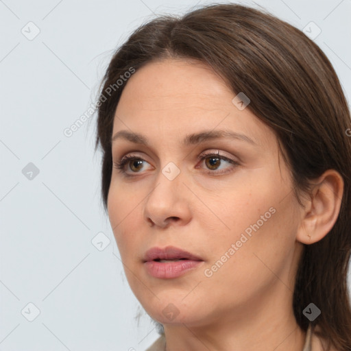 Neutral white young-adult female with medium  brown hair and brown eyes