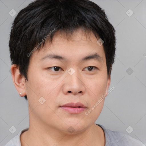 Neutral asian young-adult male with short  brown hair and brown eyes