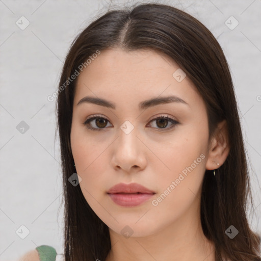 Neutral white young-adult female with long  brown hair and brown eyes