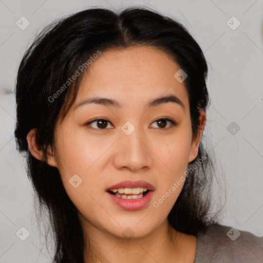 Joyful asian young-adult female with medium  black hair and brown eyes