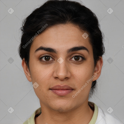 Joyful latino young-adult female with short  brown hair and brown eyes