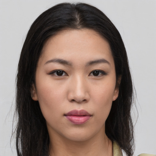 Neutral latino young-adult female with medium  black hair and brown eyes