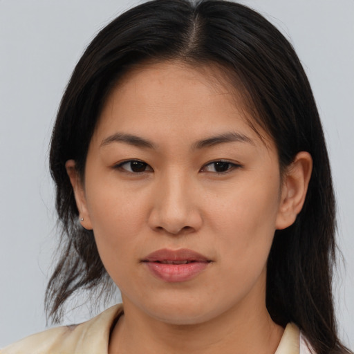 Joyful asian young-adult female with medium  brown hair and brown eyes
