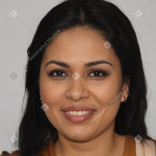 Joyful latino young-adult female with long  brown hair and brown eyes