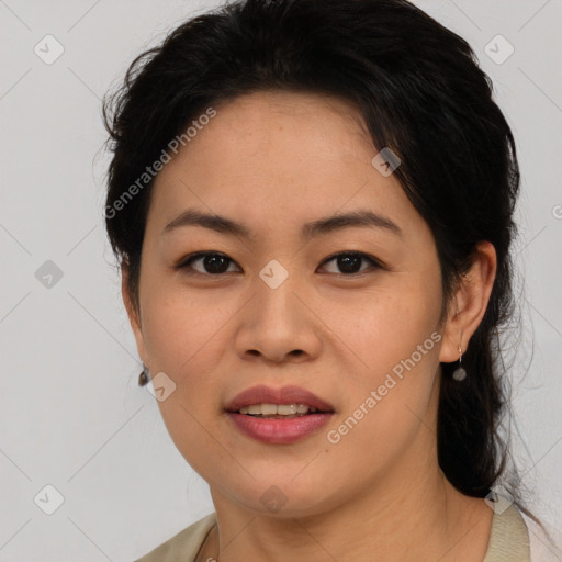 Joyful asian young-adult female with medium  brown hair and brown eyes