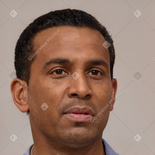 Neutral black young-adult male with short  brown hair and brown eyes