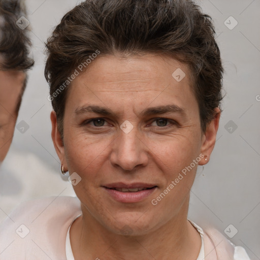 Joyful white adult female with short  brown hair and brown eyes