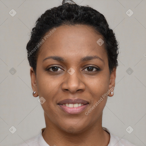 Joyful black young-adult female with short  brown hair and brown eyes