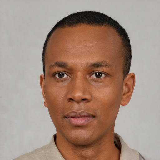 Neutral black young-adult male with short  black hair and brown eyes