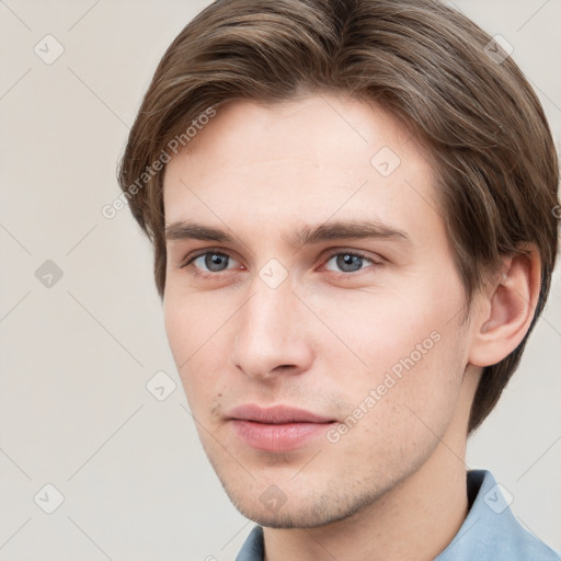 Neutral white young-adult male with short  brown hair and grey eyes