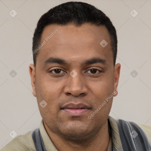 Joyful latino young-adult male with short  black hair and brown eyes
