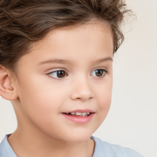 Joyful white child female with short  brown hair and brown eyes