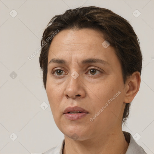 Neutral white adult female with short  brown hair and brown eyes