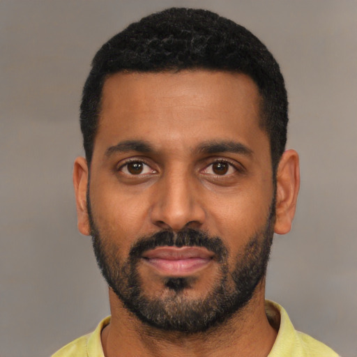 Neutral black young-adult male with short  black hair and brown eyes