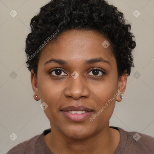 Joyful black young-adult female with short  brown hair and brown eyes