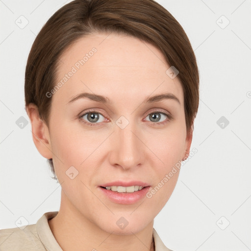 Joyful white young-adult female with short  brown hair and grey eyes