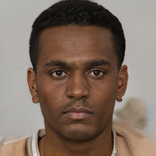 Neutral black young-adult male with short  black hair and brown eyes