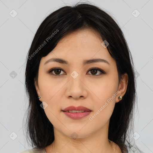 Joyful asian young-adult female with long  brown hair and brown eyes