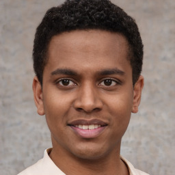 Joyful latino young-adult male with short  brown hair and brown eyes