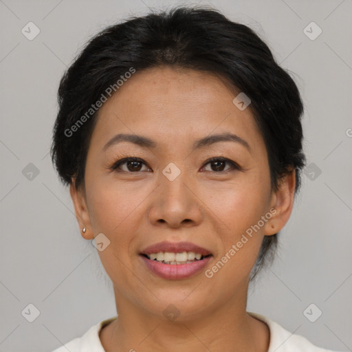 Joyful asian young-adult female with short  brown hair and brown eyes