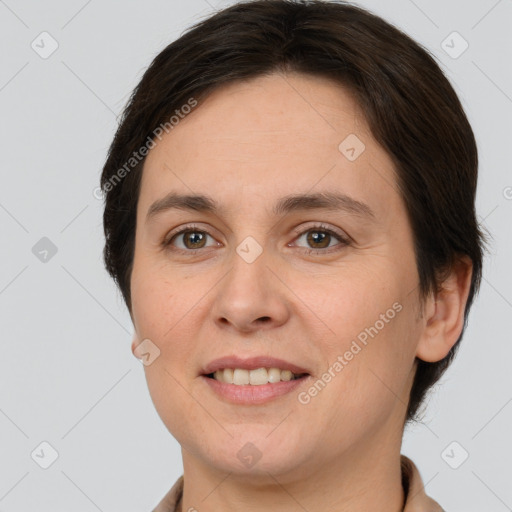 Joyful white young-adult female with short  brown hair and brown eyes