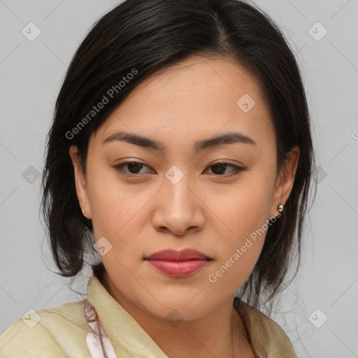 Joyful asian young-adult female with medium  brown hair and brown eyes